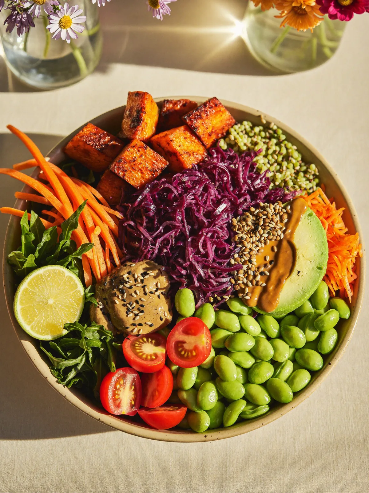 Vibrant nourish bowl piled with colourful vegetables